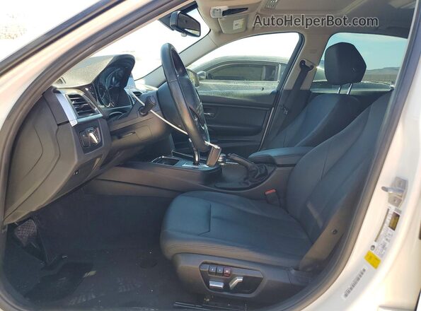 WBA8E1G59JNU91004 2018 BMW 3 SERIES Белый Вид салона спереди