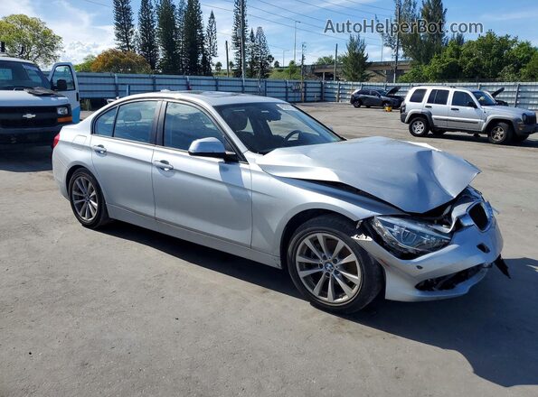WBA8E1G59JNU92475 2018 BMW 3 SERIES Silver Front right