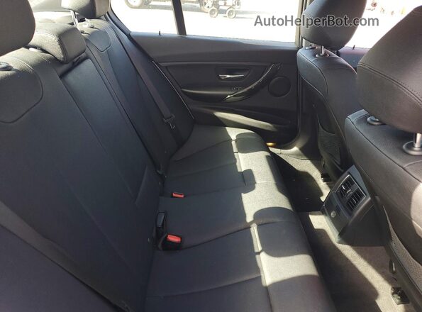 WBA8E1G59JNU92475 2018 BMW 3 SERIES Silver Rear seats view