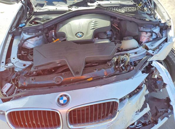 WBA8E1G59JNU92475 2018 BMW 3 SERIES Silver Rear interior view