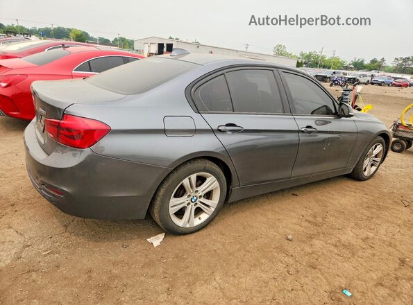 WBA8E3C54GK503085 2016 BMW 3 SERIES Gray Trasero derecho