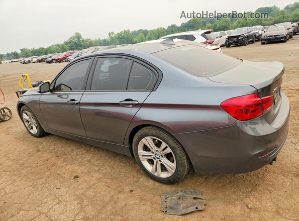 WBA8E3C54GK503085 2016 BMW 3 SERIES Gray Trasero izquierdo