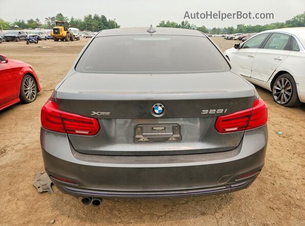 WBA8E3C54GK503085 2016 BMW 3 SERIES Gray Vista trasera