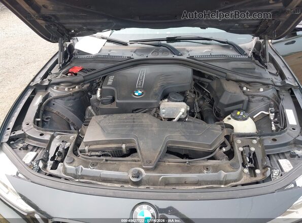 WBA8E3G55GNT76761 2016 BMW 3 SERIES Black Rear view
