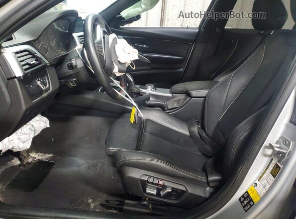 WBA8E3G59GNT76293 2016 BMW 3 SERIES Серебряный Вид салона спереди