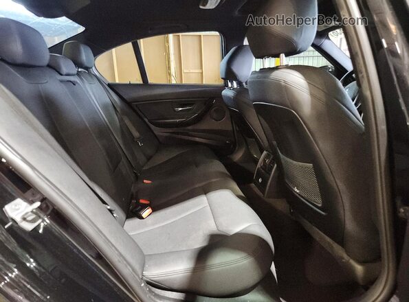 WBA8E5G54JNV03194 2018 BMW 3 SERIES Black Vista de los asientos traseros