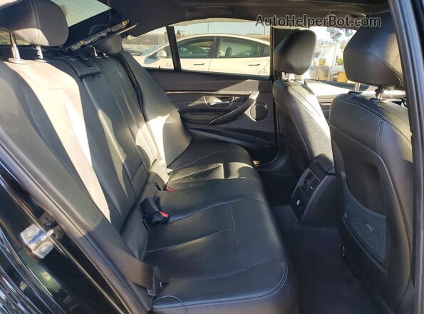 WBA8E9C55GK648154 2016 BMW 3 SERIES Black Widok tylnych siedzeń