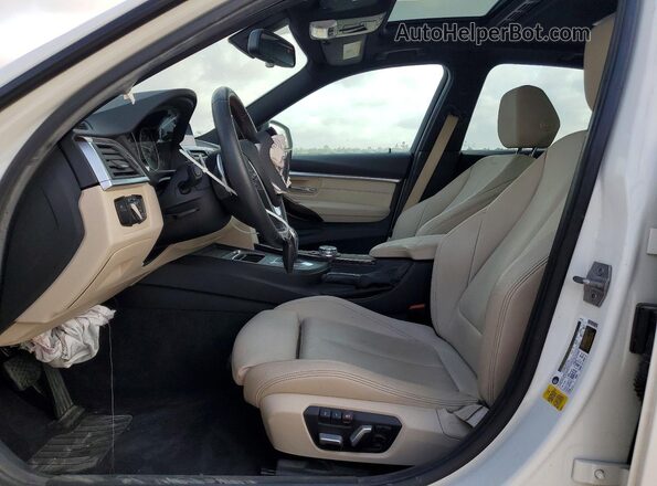 WBA8E9C58GK648942 2016 BMW 3 SERIES White Front interior view