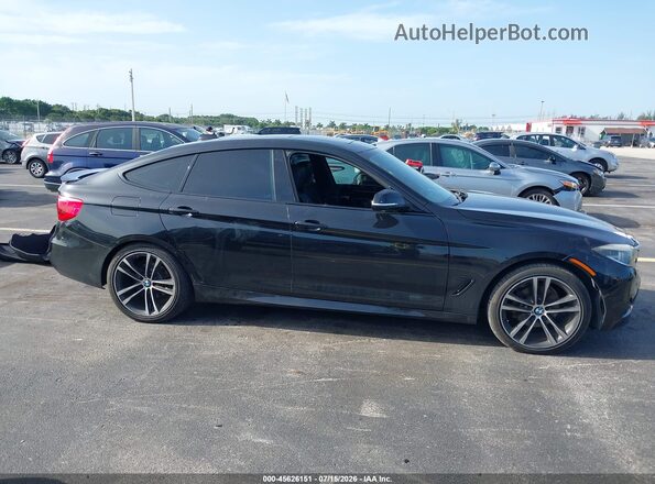 WBA8Z9C38HG826646 2017 BMW 3 SERIES Черный Вид задней части салона