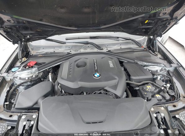 WBA8Z9C58JB219957 2018 BMW 3 SERIES Blue უკანა ხედი