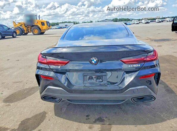 WBAAE4C02RCN50611 2024 BMW 8 SERIES Black Հետևի տեսք