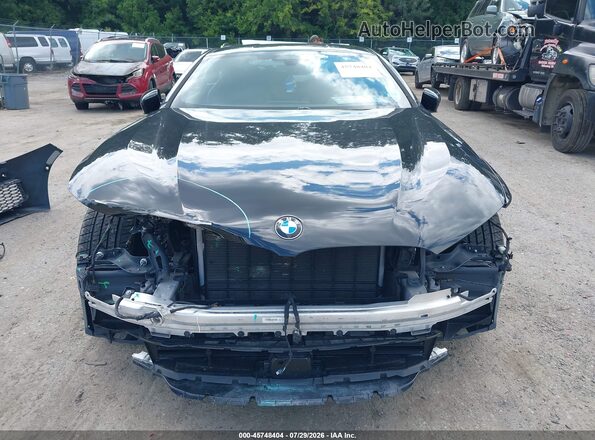 WBABC4C00MCF01946 2021 BMW M8 Black Вид задньої частини салону