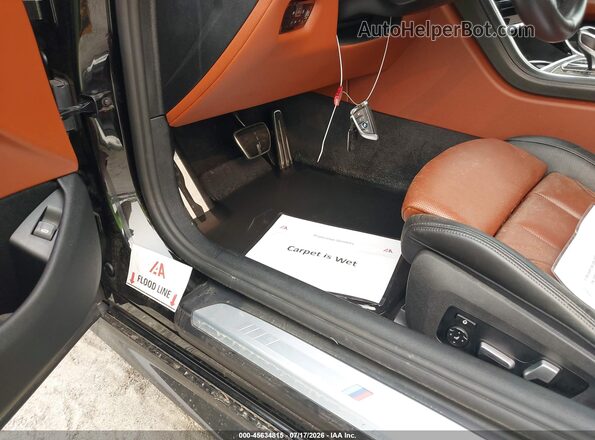 WBAFY4C08MCF96257 2021 BMW M8 Black Вид спереду
