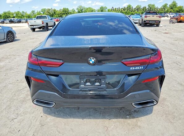 WBAGV2C02MCF68584 2021 BMW 8 SERIES Black Вид ззаду
