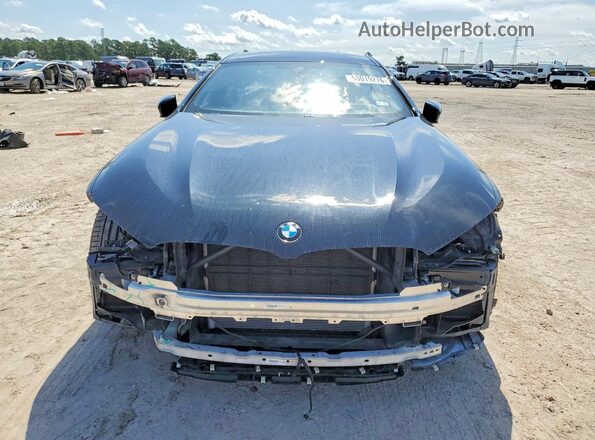 WBAGV2C02MCF68584 2021 BMW 8 SERIES Black Вид спереду