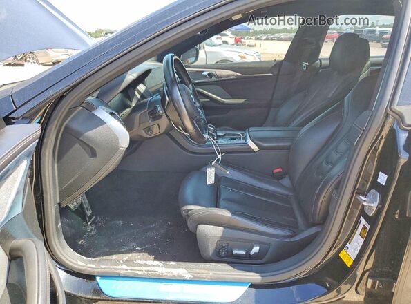 WBAGV2C02MCF68584 2021 BMW 8 SERIES Black Вид салону спереду