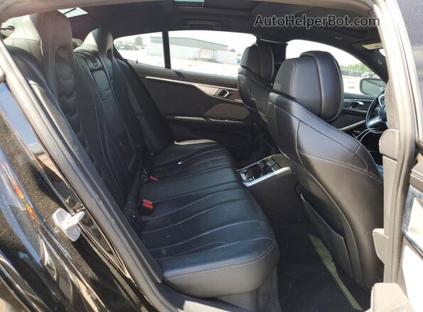 WBAGV2C02MCF68584 2021 BMW 8 SERIES Black Вид задніх сидінь