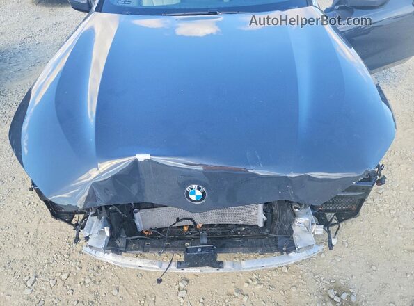 WBAGV4C05PCM39929 2023 BMW 8 SERIES Black Vista interior trasera