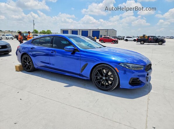 WBAGV4C0XPCM28649 2023 BMW 8 SERIES Синий Передняя правая четверть