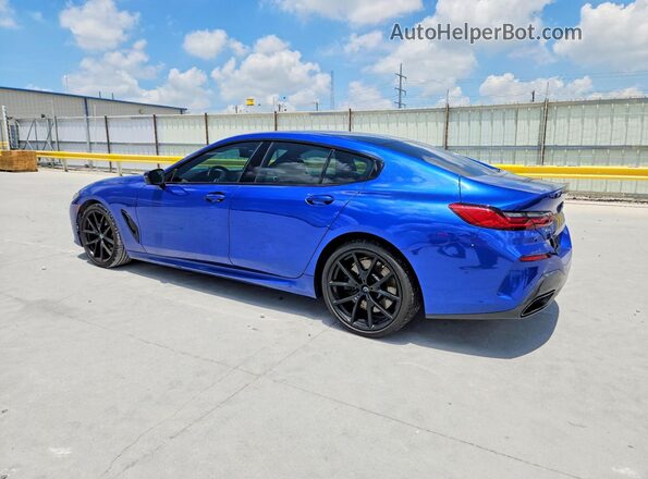 WBAGV4C0XPCM28649 2023 BMW 8 SERIES Синий Задняя левая четверть