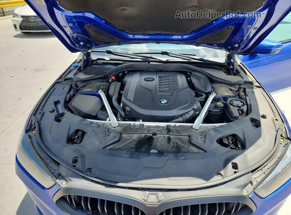 WBAGV4C0XPCM28649 2023 BMW 8 SERIES Синий Вид задней части салона