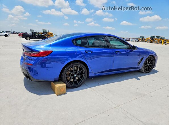 WBAGV4C0XPCM28649 2023 BMW 8 SERIES Синий Задняя правая четверть
