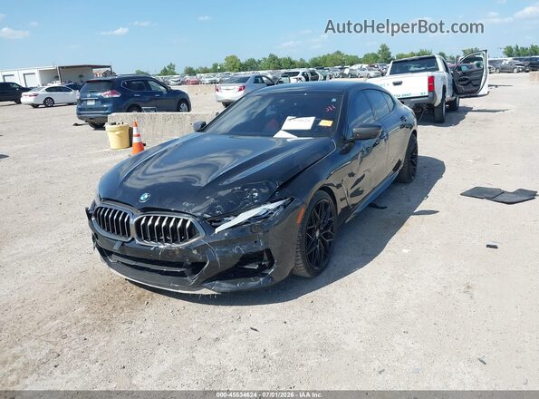 WBAGV8C00LCD64738 2020 BMW M8 Black Առջևի ձախ երեք քառորդ տեսարան