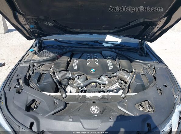 WBAGV8C00LCD64738 2020 BMW M8 Black Հետևի տեսք
