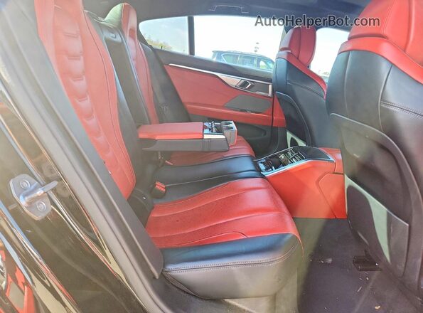 WBAGV8C00NCH86012 2022 BMW M8 Black Rear seats view