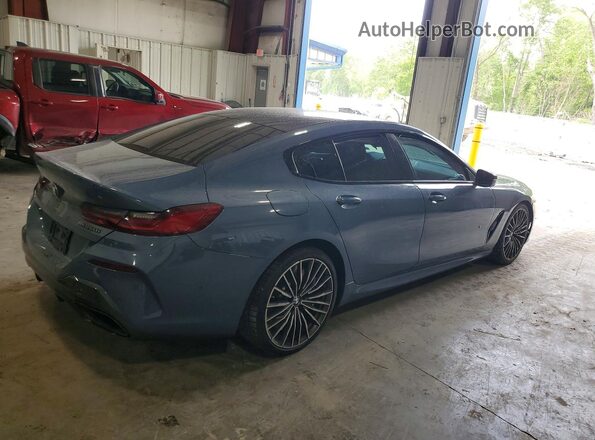 WBAGV8C02MCG42752 2021 BMW M8 Blue Rear right
