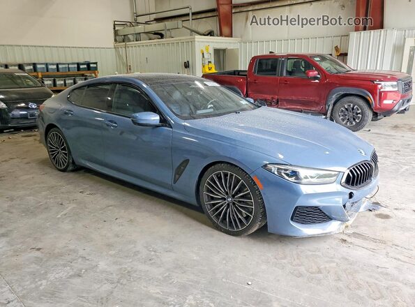 WBAGV8C02MCG42752 2021 BMW M8 Blue Front right