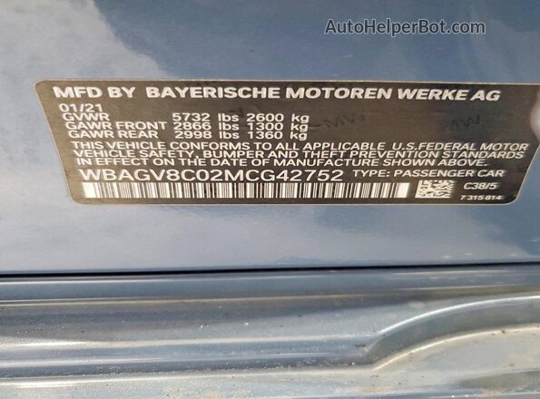 WBAGV8C02MCG42752 2021 BMW M8 Blue Engine compartment view