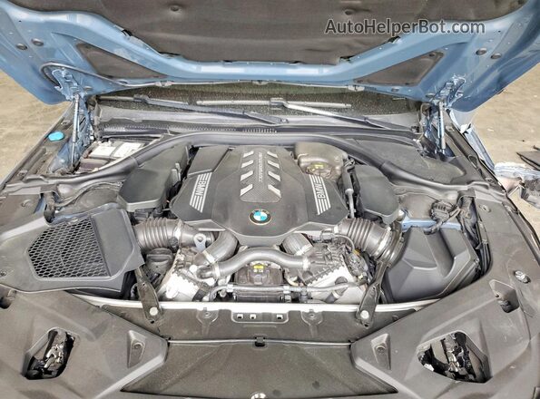 WBAGV8C02MCG42752 2021 BMW M8 Blue Rear interior view