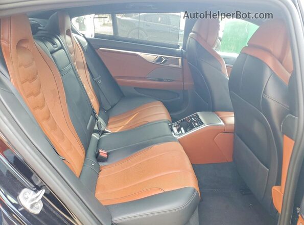 WBAGV8C03NCK22206 2022 BMW M8 Black Вид задніх сидінь