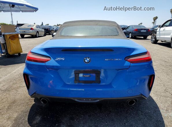 WBAHF3C06LWW54031 2020 BMW Z4 Blue Rear view