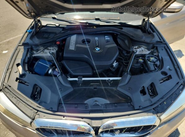 WBAJA5C33HG895679 2017 BMW 5 SERIES Tan Widok wnętrza z tyłu