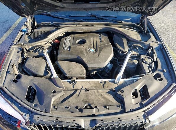 WBAJA5C50KWW13500 2019 BMW 5 SERIES Charcoal Vista interior trasera