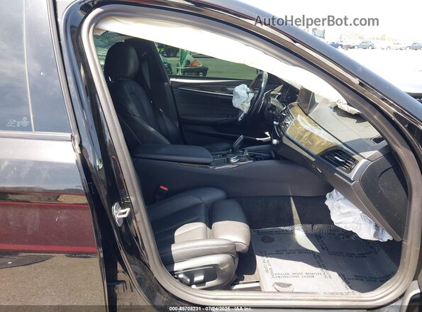 WBAJA5C54KWW39162 2019 BMW 5 SERIES Черный Вид салона спереди