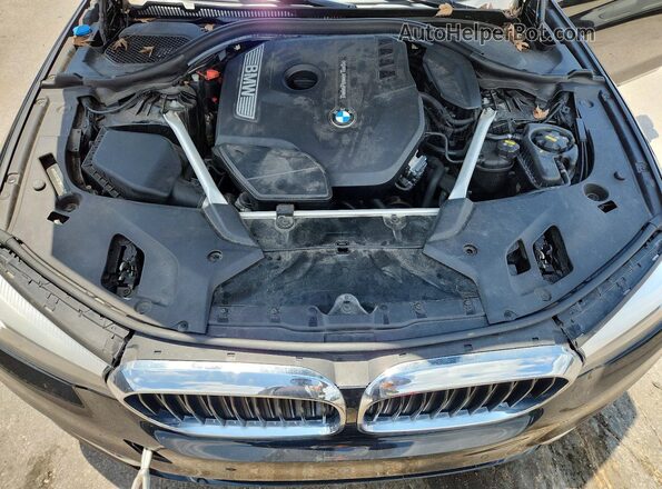 WBAJA7C57JWC77406 2018 BMW 5 SERIES Black Widok wnętrza z tyłu