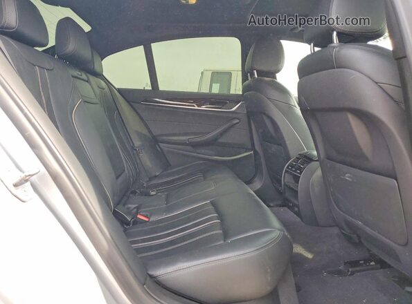 WBAJA9C52JB252865 2018 BMW 5 SERIES Silver Rear seats view