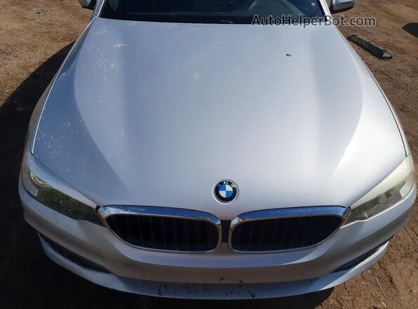 WBAJA9C54JB252883 2018 BMW 5 SERIES Silver Vista interior trasera