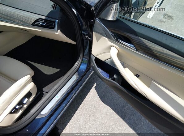 WBAJA9C58JB249114 2018 BMW 5 SERIES Синий Вид салона спереди
