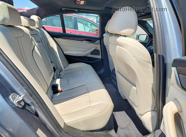 WBAJB1C57JB084185 2018 BMW 5 SERIES Blue Vista de los asientos traseros