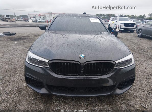 WBAJB9C54KB288345 2019 BMW 5 SERIES Black Rear interior view