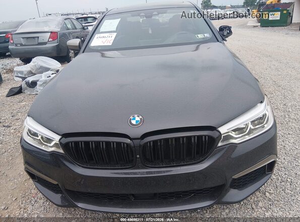 WBAJB9C57JB036765 2018 BMW 5 SERIES Black Սալոնի հետևի տեսք