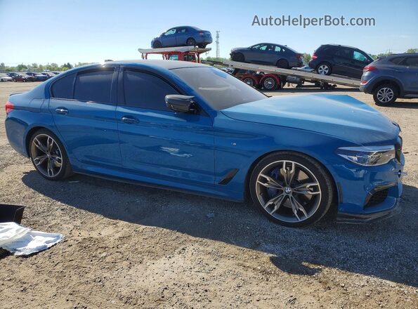 WBAJB9C5XJB049719 2018 BMW M5 Синий Передняя правая четверть