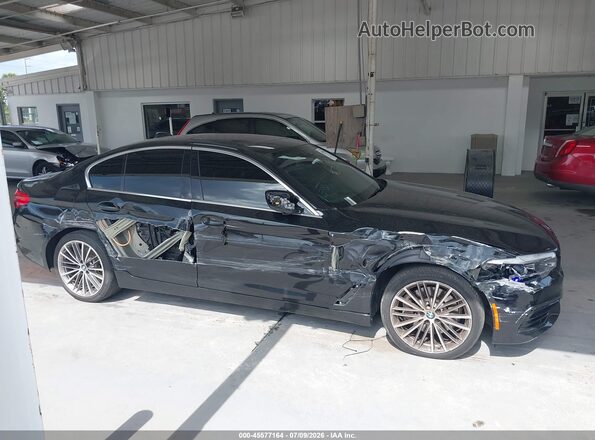 WBAJE5C55KWW16414 2019 BMW 5 SERIES Черный Вид задней части салона