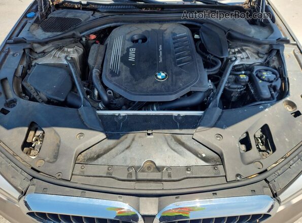 WBAJE5C58JWA93066 2018 BMW 5 SERIES Gold Rear interior view