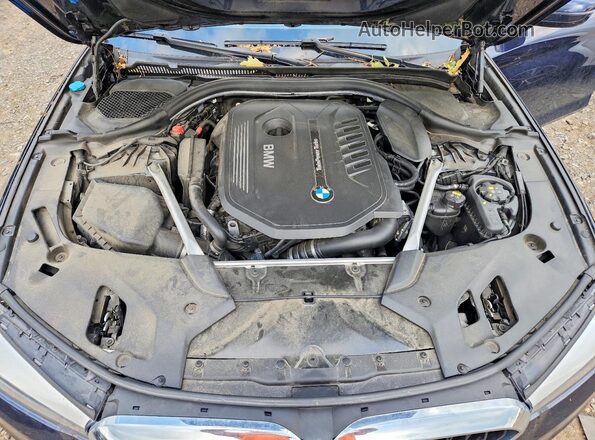 WBAJE7C52KWW38141 2019 BMW 5 SERIES Синий Вид задней части салона
