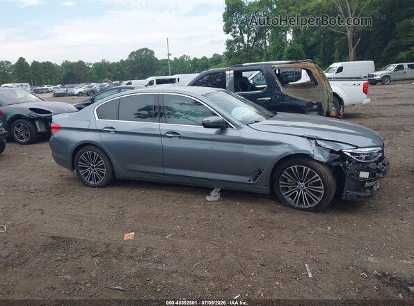 WBAJE7C53JG892174 2018 BMW 5 SERIES Gray Widok wnętrza z tyłu